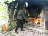 firing up the wood kiln - Jason Shackleton